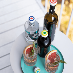 Set de 4 bouchons de bouteilles en porcelaine et silicone , lavable au lave vaiselle Remember